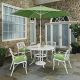 HOMESTYLES Sanibel White 7-pc Cast Aluminium Round Dining Set with Green Cushions and Umbrella