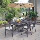 HOMESTYLES Grenada Taupe Tan 7-pc Cast Aluminum Rectangular Outdoor Dining Set with Umbrella with Natural Tan Cushions