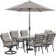 Hanover Lavallette 7-pc Steel Outdoor Dining Set with Silver Linings Cushions, Chairs, Swivel Rockers, Table, Umbrella/Base