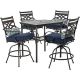 Hanover Montclair 5-pc Steel Outdoor Bar Height Dining Set with Navy Blue Cushions, 4-Swivel Chairs and a 33 in. Dining Table
