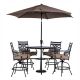 Hanover Montclair 5-pc Steel Outdoor Dining Set with Tan Cushions, 4 Swivel Chairs, 33 in. Counter Height Table and Umbrella