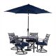 Hanover Montclair 5-pc Steel Outdoor Dining Set with Navy Cushions, 4 Swivel Rockers, 40 in. Table and 9 ft. Umbrella