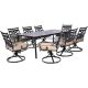 Hanover Montclair 9-Piece Steel Outdoor Dining Set with Tan Cushions, 8 Swivel Rockers and 42 in. x 84 in. Table