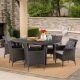 Noble House Jax Grey 7-Piece Faux Rattan Oval Outdoor Dining Set with Silver Cushions 23452