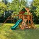 Gorilla Playsets Chateau Wooden Outdoor Playground Set with Slide, Sandbox, Rock Wall, Swing Set, and Playground Equipment